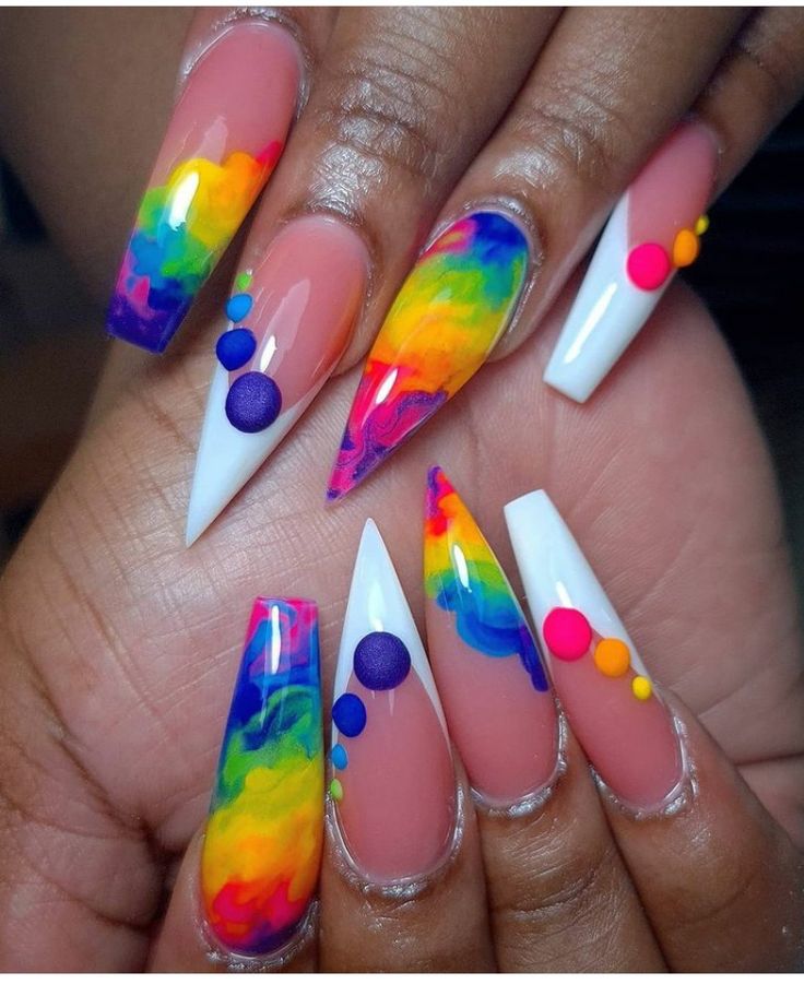 Marble nail art design with a swirling pattern in rainbow colors