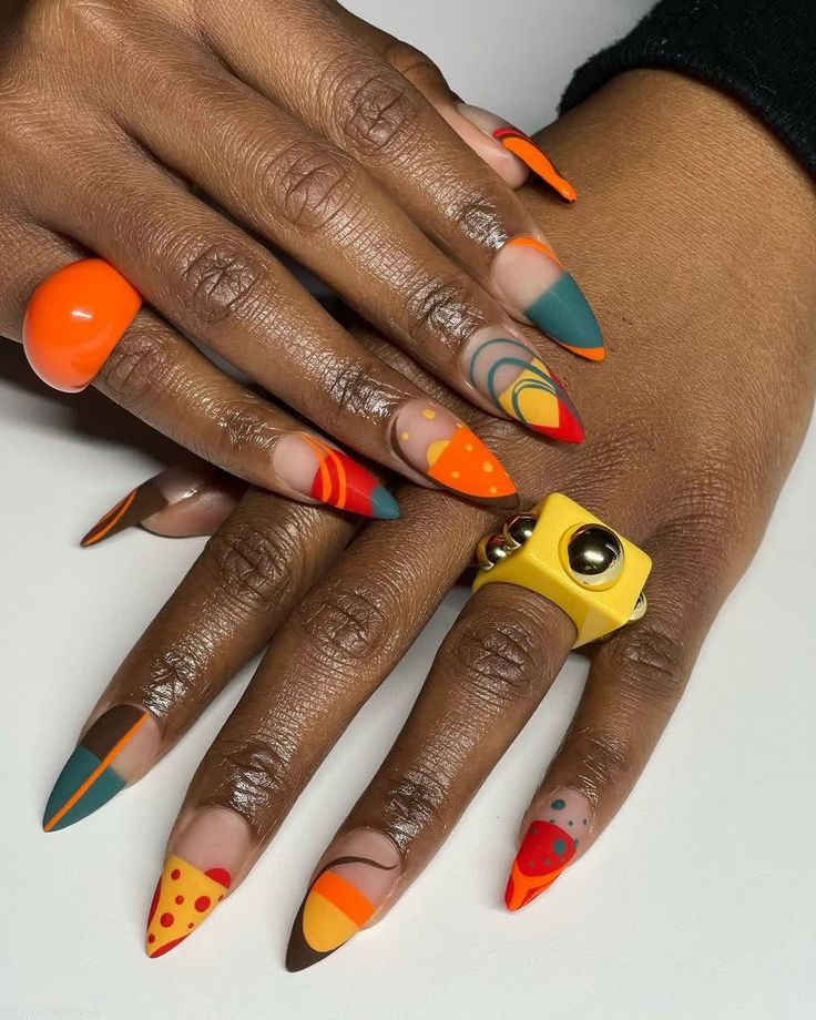 Geometric nail art with sharp lines and contrasting colors for a bold look